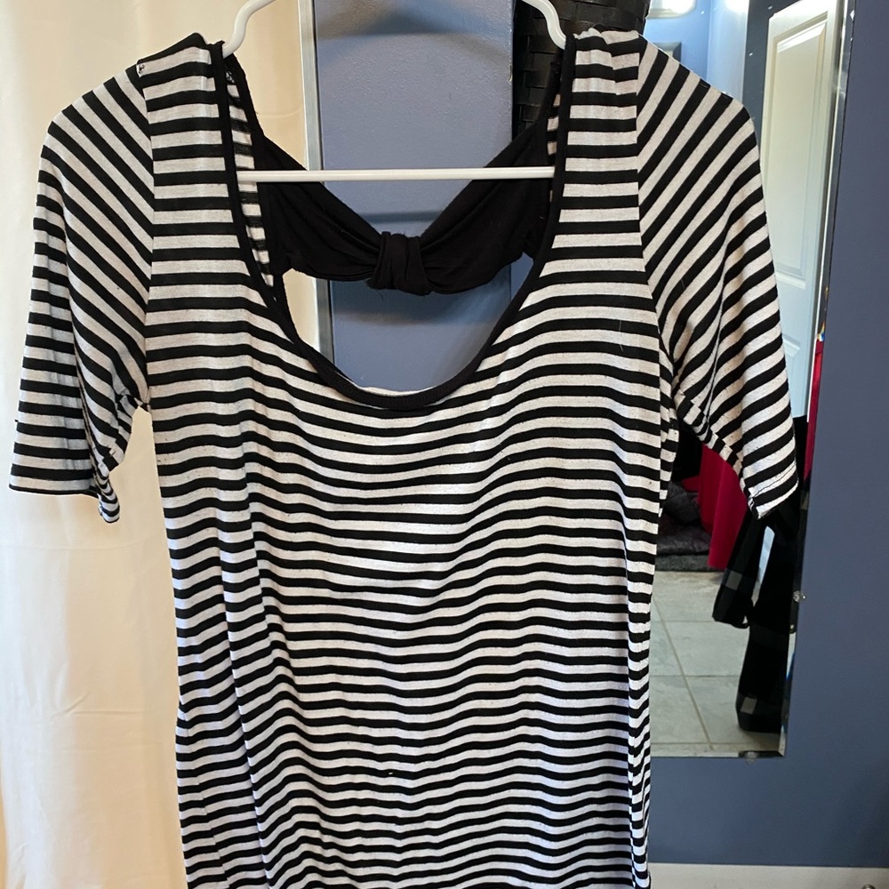 3/4 length open back shirt with bow cut outs